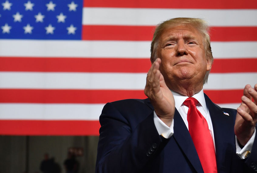 US President Donald Trump speaks during a "Keep America Great" campaign rally at the SNHU Arena in Manchester, New Hampshire, on August 15, 2019. (Getty/Nicholas Kamm)