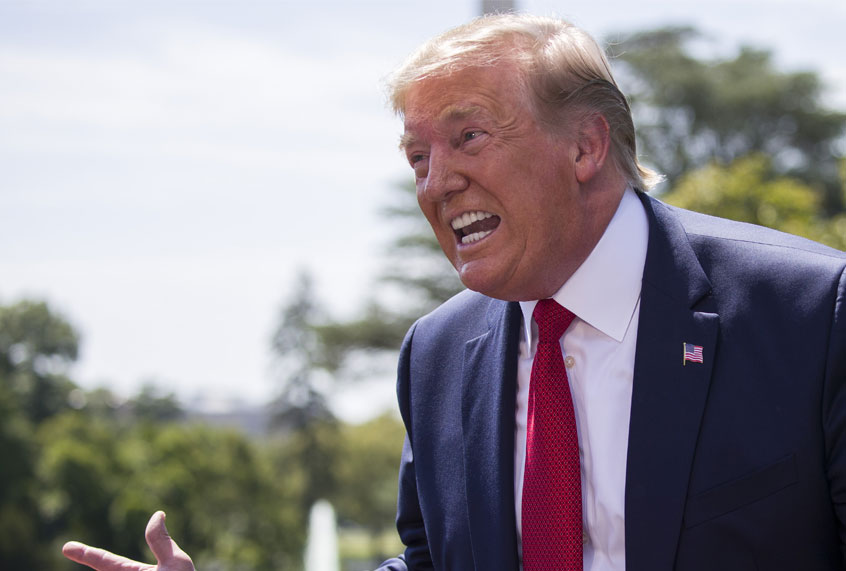 President Donald Trump speaks with reporters before departing on Marine One on the South Lawn of the White House, Wednesday, Aug. 21, 2019, in Washington. (AP/Alex Brandon)