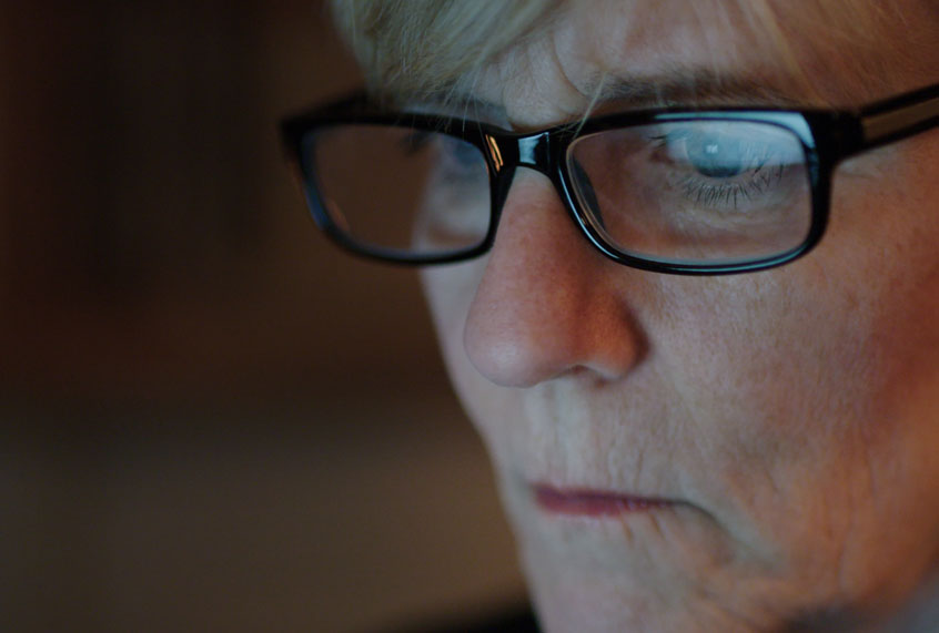 Dr. Lisa Sanders writing her article for the New York Times (Courtesy of Netflix)