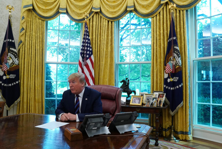 U.S. President Donald Trump speaks to members of the press during a signing of a “safe third country” agreement in the Oval Office of the White House July 26, 2019 in Washington, DC. (Alex Wong/Getty Images)