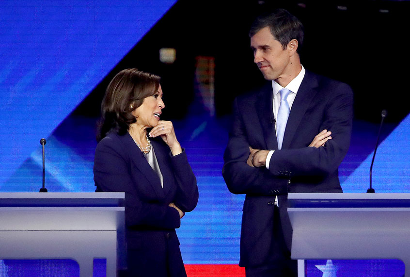 Democratic presidential candidates Sen. Kamala Harris (D-CA) and former Texas congressman Beto O'Rourke converse during a break in the Democratic Presidential Debate at Texas Southern University's Health and PE Center on September 12, 2019 in Houston, Texas. (Win McNamee/Getty Images)