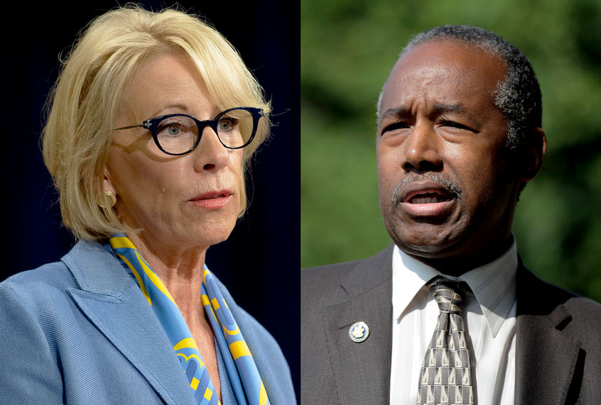 Betsy DeVos and Ben Carson (AP Photo/Julio Cortez/Getty Images/AFP/Saul Loeb)
