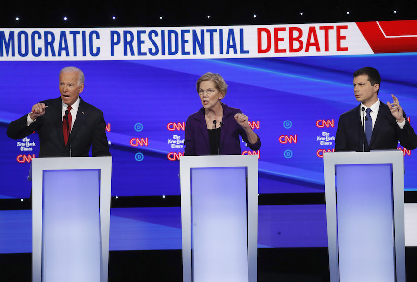 Democratic presidential candidate former Vice President Joe Biden, left, Sen. Elizabeth Warren, D-Mass., middle, and South Bend Mayor Pete Buttigieg in a Democratic presidential primary debate, Tuesday, Oct. 15, 2019, in Westerville, Ohio. (AP Photo/John Minchillo)