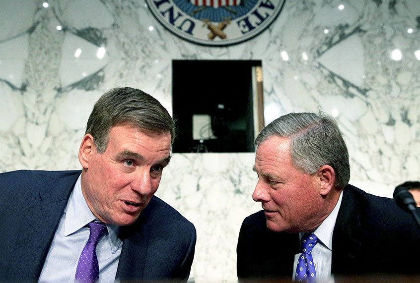 Committee chairman Sen. Richard Burr talks to vice chairman Sen. Mark Warner (Alex Wong/Getty Images)