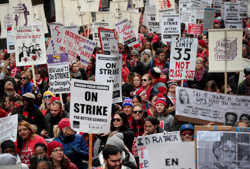 Striking Chicago public school teachers and their supporters march through the Loop on October 17, 2019 in Chicago, Illinois. (Scott Olson/Getty Images)