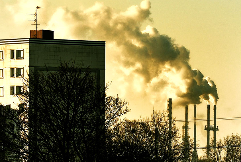 Smoke rises from factory stacks in Santes, near Lille, on January 22, 2013. (PHILIPPE HUGUEN/AFP/Getty Images)