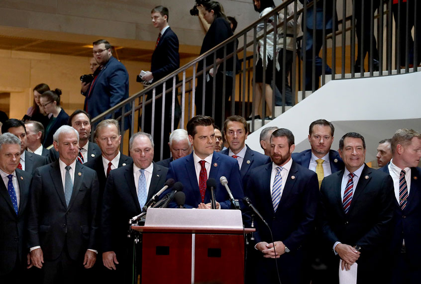 Flanked by about two dozen House Republicans, U.S. Rep. Matt Gaetz (R-FL) speaks during a press conference at the U.S. Capitol October 23, 2019 in Washington, DC. Rep. Gaetz held the press conference to call for transparency in the impeachment inquiry. (Alex Wong/Getty Images)