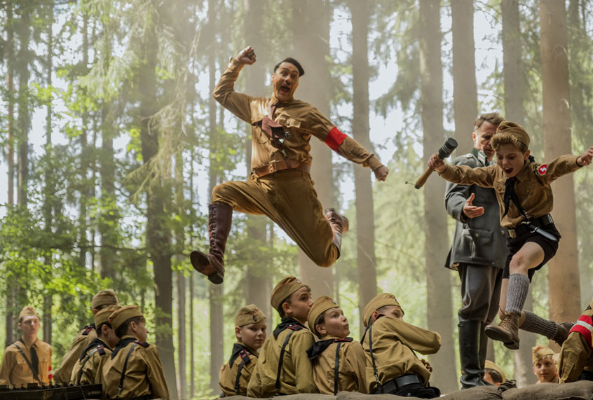 Taika Waititi and Roman Griffin Davis in the film JOJO RABBIT. (Fox Searchlight/Kimberly French)