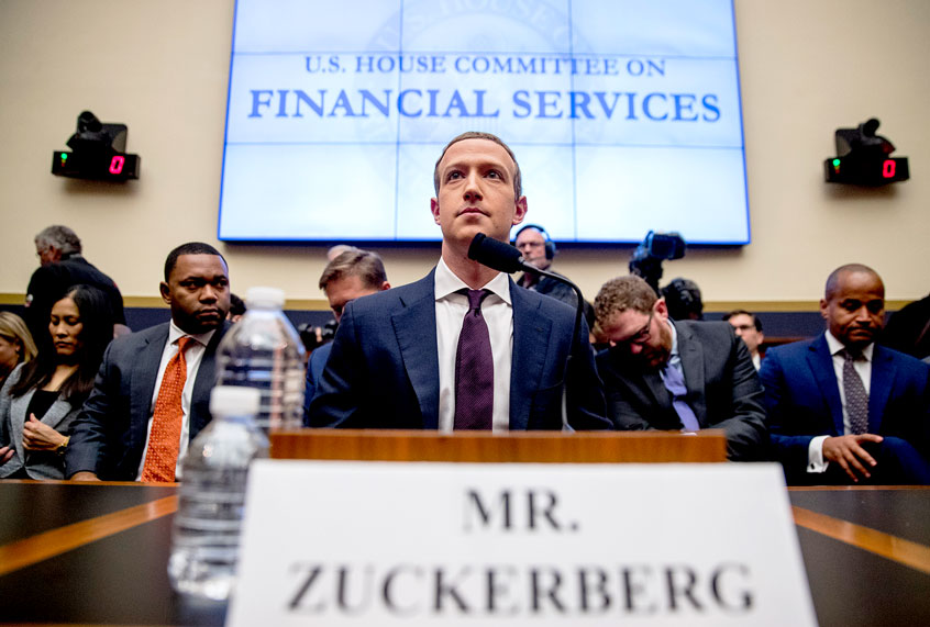 Facebook CEO Mark Zuckerberg arrives for a House Financial Services Committee hearing on Capitol Hill in Washington, Wednesday, Oct. 23, 2019, on Facebook's impact on the financial services and housing sectors. (AP Photo/Andrew Harnik)