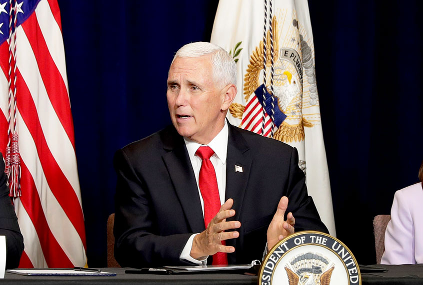 Vice President Mike Pence, center, speaks as Republican Arizona Gov. Doug Ducey, left, and Sen. Martha McSally, R-Ariz., listen during a Southwest Hispanic Leaders roundtable in honor of Hispanic Heritage Month, Thursday, Oct. 3, 2019, in Scottsdale, Ariz. (AP Photo/Matt York)
