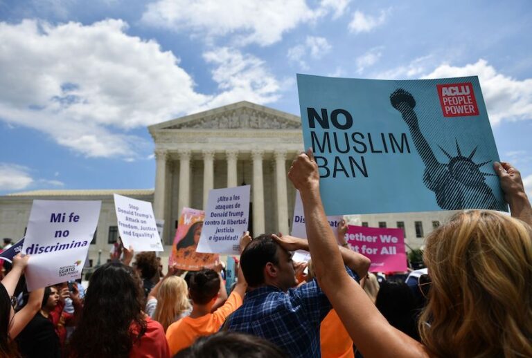 People protest the Muslim travel ban outside of the US Supreme Court in Washington, DC on June 26, 2018. (Mandel Ngan/AFP via Getty Images)