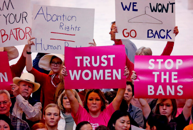 activists gather in the Utah State Capitol Rotunda to protest abortion bans happening in Utah and around the country, in Salt Lake City. About 39,000 people received treatment from Planned Parenthood of Utah in 2018 under a federal family planning program called Title X. The organization this week announced it is pulling out of the program rather than abide by a new Trump administration rule prohibiting clinics from referring women for abortions. (AP Photo/Rick Bowmer)
