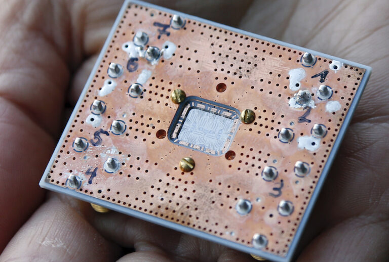 This Feb. 27, 2018, photo shows a seven cubit quantum device is seen at the IBM Thomas J. Watson Research Center in Yorktown Heights, N.Y. Conventional computers process information as a stream of bits, each of which can be either a zero or a one in the binary language of computing. But quantum bits, known as qubits, can register zero and one simultaneously. (AP Photo/Seth Wenig)