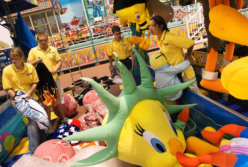Russian students working at a Jolly Roger amusement park prepare stuffed animals for prizes in Ocean City, Maryland. (Mandel Ngan/AFP/Getty Images)