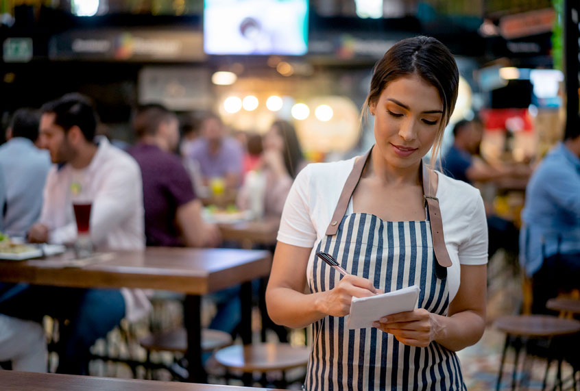 Waitress working at a restaurant (Getty Images)