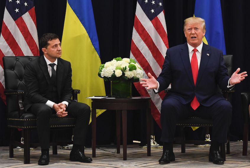 US President Donald Trump speaks as Ukrainian President Volodymyr Zelensky looks on during a meeting in New York on September 25, 2019, on the sidelines of the United Nations General Assembly. (Photo by SAUL LOEB / AFP)        (Photo credit should read SAUL LOEB/AFP/Getty Images) (Saul Loeb/AFP/Getty Images)