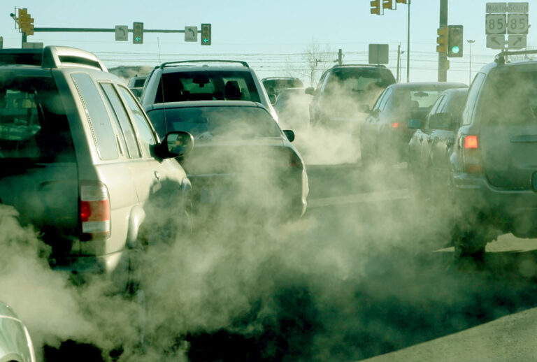 Polluting clouds of exhaust fumes rise in the air (Getty Images)