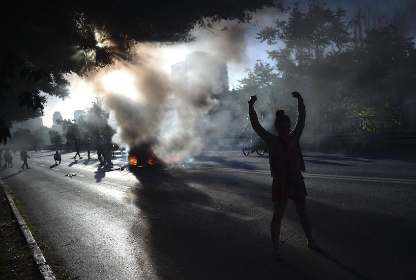 People demonstrate by a bonfire during a protest against the government in Santiago on November 15, 2019. (Rodrigo Arangua/AFP via Getty Images)