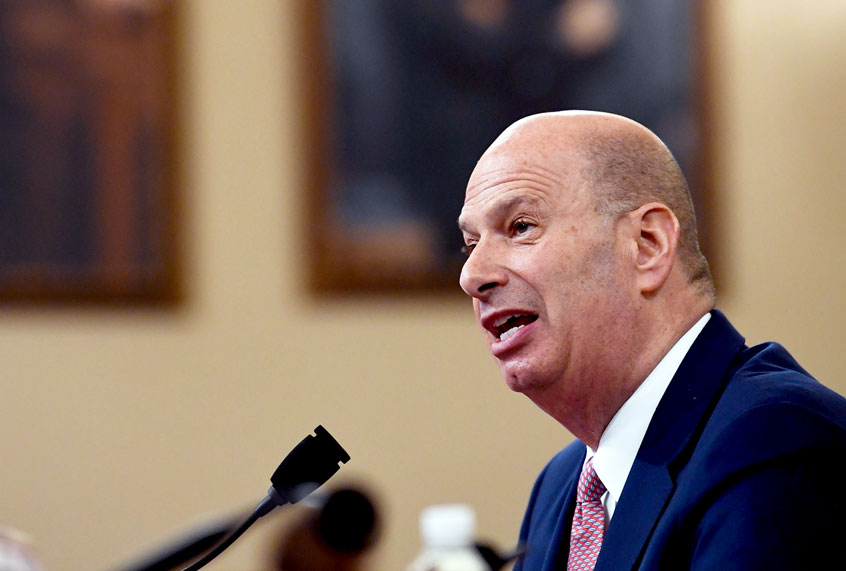 U.S. Ambassador to the European Union Gordon Sondland gives his opening statement as he testifies before the House Intelligence Committee on Capitol Hill in Washington, Wednesday, Nov. 20, 2019, during a public impeachment hearing of President Donald Trump's efforts to tie U.S. aid for Ukraine to investigations of his political opponents. (AP Photo/Susan Walsh)