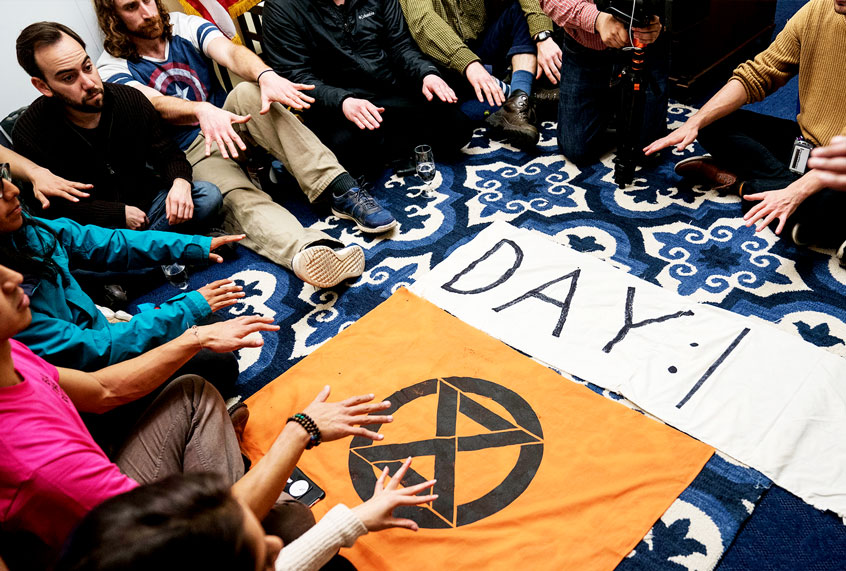 Extinction Rebellion protestors participate in a hunger strike and "grief session" in House Speaker Nancy Pelosi's Office in Longworth House Office Building on November 18, 2019 in Washington, DC. The strike is planned to be held all week or until Speaker Pelosi agrees to sit with the group for a one hour on-camera interview about climate change. (Sarah Silbiger/Getty Images)