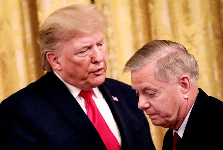 President Donald Trump speaks to Sen. Lindsey Graham (Drew Angerer/Getty Images)