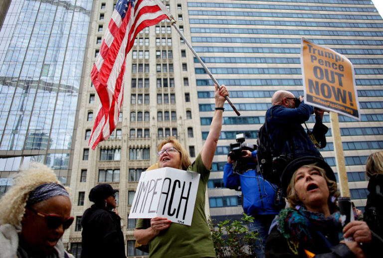 Demonstrators protest President Donald Trump's visit to Chicago outside Trump International Hotel & Tower on October 28, 2019 in Chicago, Illinois. Trump, who visited Chicago for the first time since taking office addressed the International Association of Chiefs of Police meeting at McCormick Place and attended a fundraiser. (Joshua Lott/Getty Images)