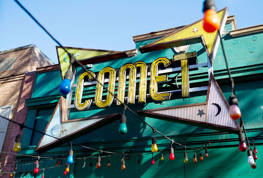 In this Dec. 5, 2016, photo, the front door of Comet Ping Pong pizza shop, in Washington, Monday, Dec. 5, 2016. For conspiracy theorists, "pizzagate" didn't end when a man brought a gun to a Washington restaurant in a misguided attempt to rescue child sex slaves, instead, the shooting fired up further belief in the baseless claims. On blogs, YouTube channels and internet radio shows devoted to conspiracy theories, some see Edgar Maddison Welch’s as the latest “false flag.” That’s a term for a cover-up or distraction orchestrated by the government or other powerful figures. (AP Photo/Jose Luis Magana)