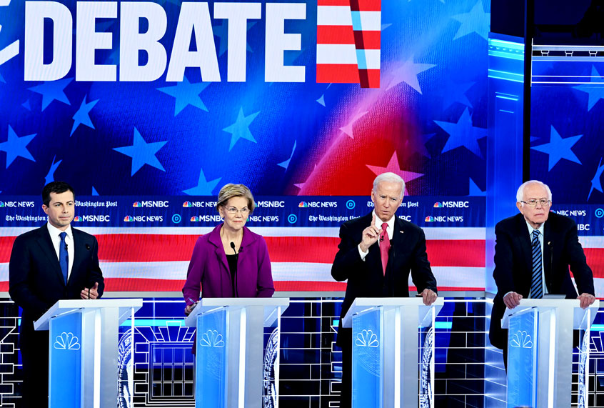 Democratic presidential hopefuls Mayor of South Bend Pete Buttigieg, Massachusetts Senator Elizabeth Warren, Former Vice President Joe Biden and Vermont Senator Bernie Sanders participate in the fifth Democratic primary debate of the 2020 presidential campaign season co-hosted by MSNBC and The Washington Post at Tyler Perry Studios in Atlanta, Georgia on November 20, 2019. (SAUL LOEB / AFP) (Photo by SAUL LOEB/AFP via Getty Images)