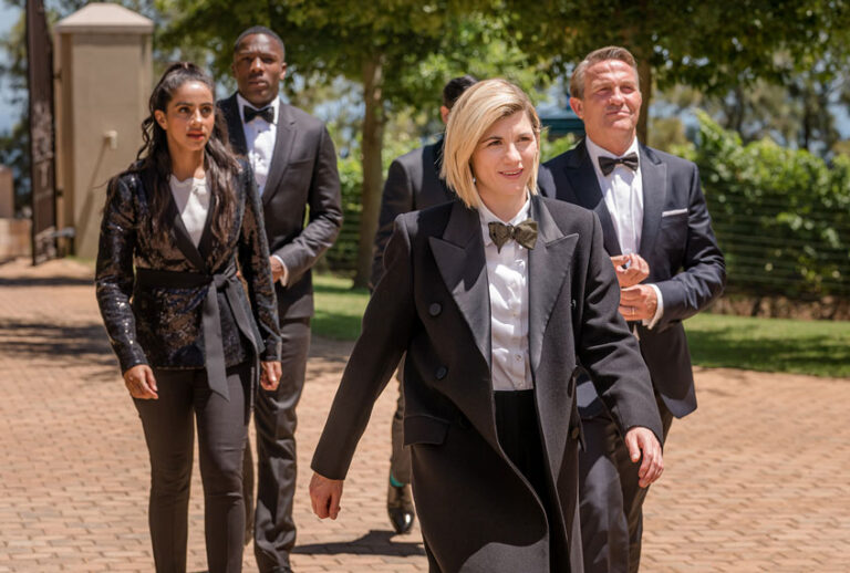 Mandip Gill as Yasmin Khan, Tosin Cole as Ryan Sinclair, Jodie Whittaker as The Doctor, Bradley Walsh as Graham O'Brien - Doctor Who Season 12 (Ben Blackall/BBC Studios/BBC America)