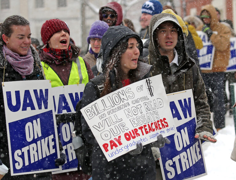 Harvard grad students out on strike held a rally outside University Hall and then marched around Harvard Yard. (David L Ryan/Globe Staff ) SECTION: METRO TOPIC 04harvard (David L. Ryan/The Boston Globe via Getty Images)