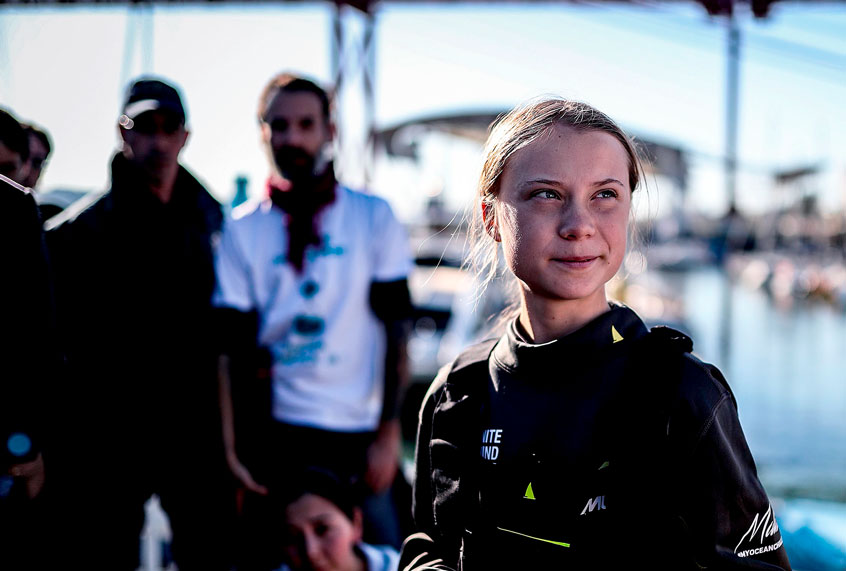 Swedish climate activist Greta Thunberg is pictured after disembarking from the catamaran La Vagabonde at the Santo Amaro docks in Lisbon, on December 3, 2019. (Photo by CARLOS COSTA / AFP) (Photo by (CARLOS COSTA/AFP via Getty Images)