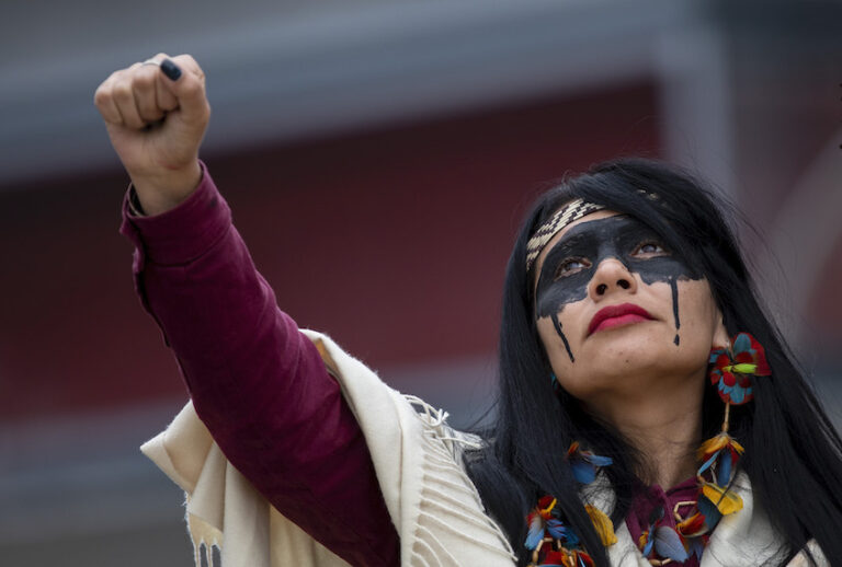 An indigenous leader from Brazil takes part in a protest outside REPSOL Headquarters on December 08, 2019 in Madrid, Spain. Indigenous leaders and activists are protesting in Madrid against oil contamination and the fossil fuel industry in Brazil because of the damage it provokes to the poorest communities, sea life, food supplies and the climate. (Pablo Blazquez Dominguez/Getty Images)