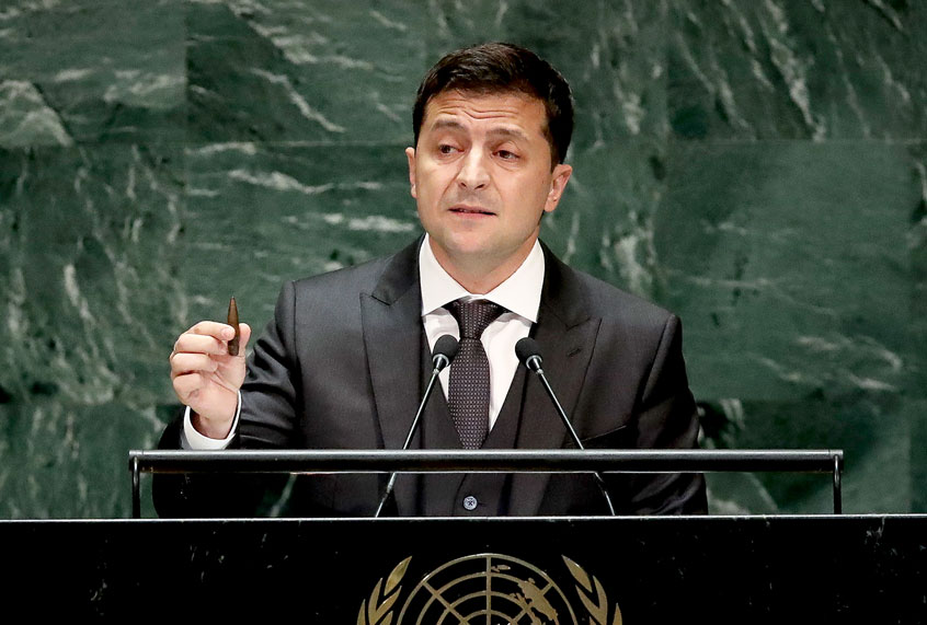 President of Ukraine Volodymyr Zelenskyy holds up a bullet as he addresses the United Nations General Assembly at UN headquarters (Drew Angerer/Getty Images)