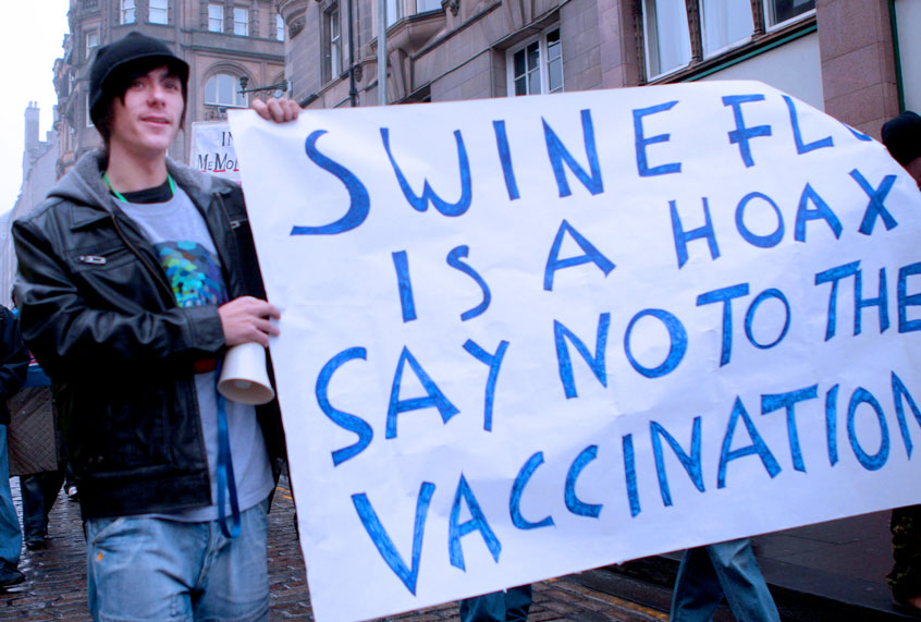 Protesters march to the Scottish Parliament in an "anti-swine flu vaccination protest" along the Royal Mile Edinburgh. (David Cheskin/PA Images via Getty Images)