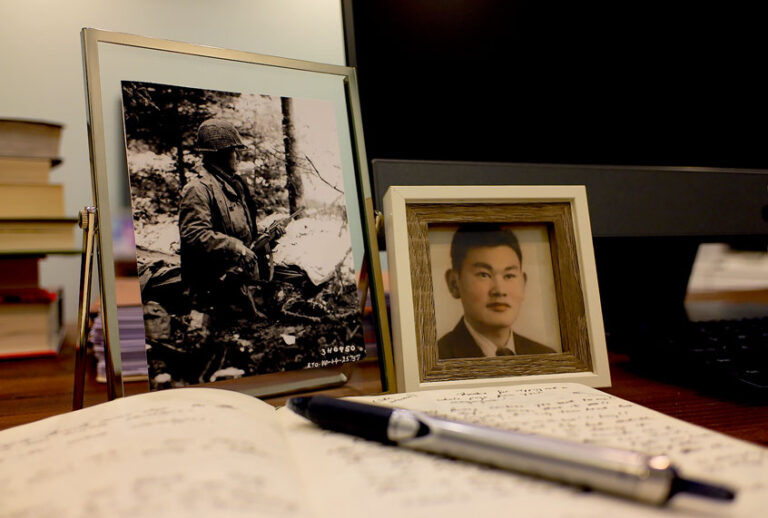 Framed photos of Fred Korematsu, on the desk of Andrew Fukuda (Courtesy of publicist)