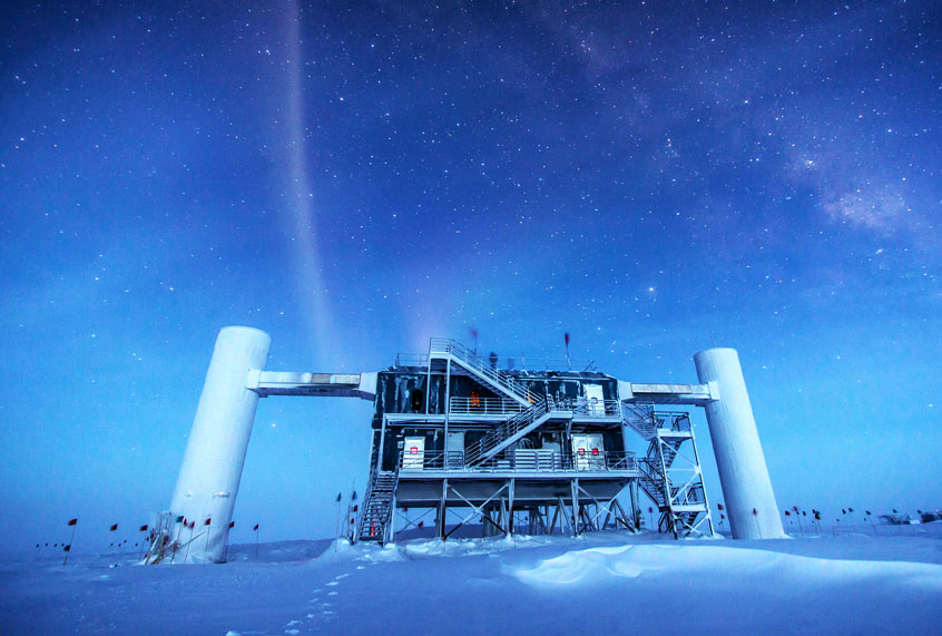 The IceCube Laboratory at the Amundsen-Scott South Pole Station, in Antarctica, hosts the computers collecting raw data. Due to satellite bandwidth allocations, the first level of reconstruction and event filtering happens in near real time in this lab. Only events selected as interesting for physics studies are sent to UW–Madison, where they are prepared for used by any member of the IceCube Collaboration. (Felipe Pedreros/IceCube/NSF)