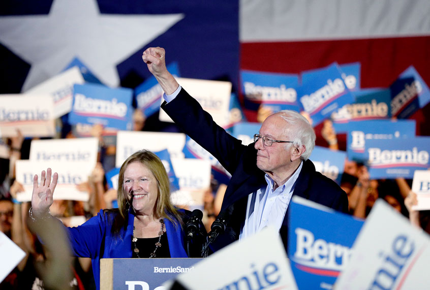Democratic presidential candidate Sen. Bernie Sanders, I-Vt., right, with his wife Jane, speaks during a campaign event in San Antonio, Saturday, Feb. 22, 2020. (AP Photo/Eric Gay)