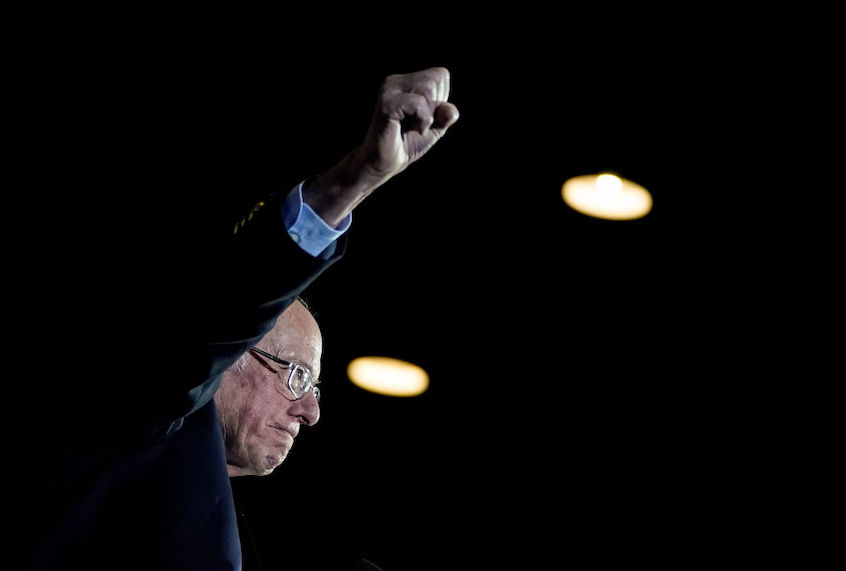 Democratic presidential candidate Sen. Bernie Sanders (I-VT) raises his fist as he arrives onstage after winning the Nevada caucuses during a campaign rally at Cowboys Dancehall on February 22, 2020 in San Antonio, Texas. (Drew Angerer/Getty Images)