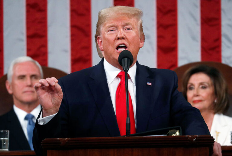 President Donald Trump delivers his State of the Union address to a joint session of Congress in the House Chamber on Capitol Hill in Washington, Tuesday, Feb. 4, 2020, as Vice President Mike Pence and Speaker Nancy Pelosi look on. (Leah Millis/Pool via AP)