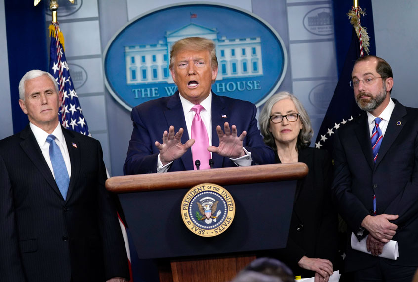 President Donald Trump, with members of the president's coronavirus task force, speaks during a news conference in the Brady Press Briefing Room of the White House, Wednesday, Feb. 26, 2020, in Washington. (AP Photo/Evan Vucci)