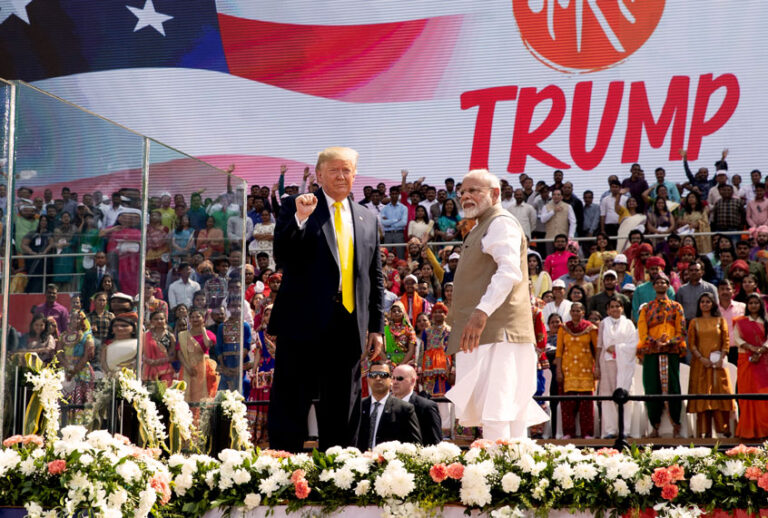 U.S. President Donald Trump and Indian Prime Minister Narendra Modi wave after a "Namaste Trump," event at Sardar Patel Gujarat Stadium, Monday, Feb. 24, 2020, in Ahmedabad, India. India poured on the pageantry with a joyful, colorful welcome for President Donald Trump on Monday that kicked off a whirlwind 36-hour visit meant to reaffirm U.S.-India ties while providing enviable overseas imagery for a president in a re-election year. (AP Photo/Alex Brandon)