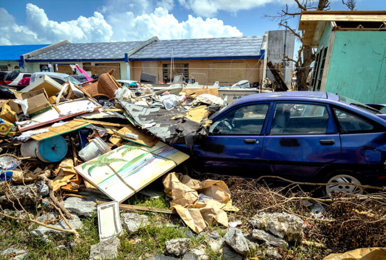 Debris lies around a damaged home in the aftermath of Hurricane Dorian on September 10, 2019 in Grand Bahama, Bahamas. The official death toll has risen in the time since to 50 people, but authorities have cautioned that number is likely to rise significantly as workers make their way through the ruins. (Alejandro Granadillo/Anadolu Agency via Getty Images)