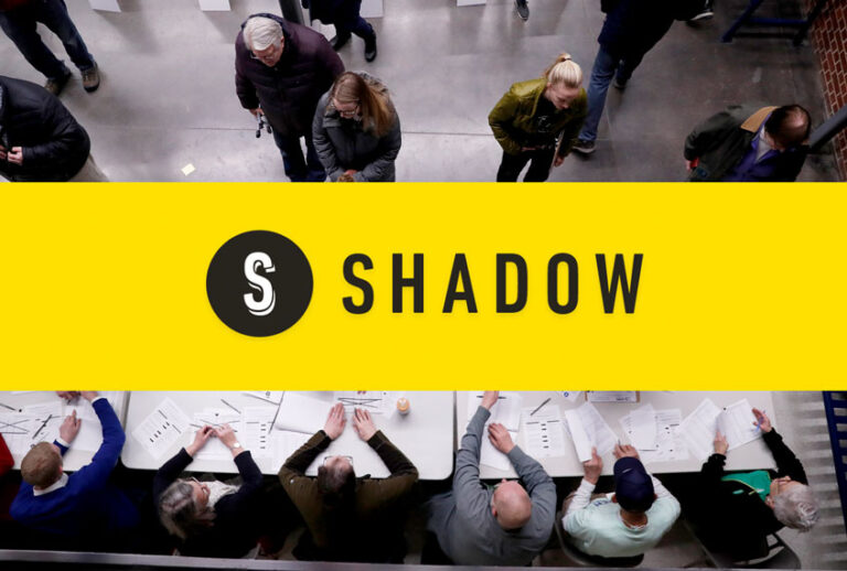 Shadow, Inc. / Caucus goers check in at a caucus at Roosevelt Hight School, Monday, Feb. 3, 2020, in Des Moines, Iowa. (AP Photo/Andrew Harnik/Shadow, Inc.)