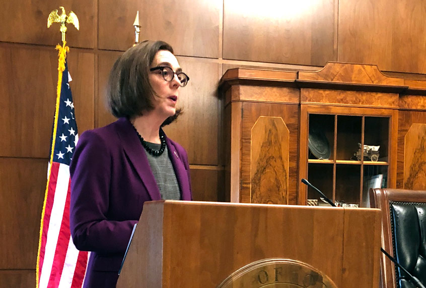 Gov. Kate Brown of Oregon denounces a walkout by Republicans in the state Senate that prevented a quorum on Monday, Feb. 24, 2020 in Salem, Ore. Republican lawmakers are trying to doom a contentious climate change bill. Brown said the Republicans are not against the climate policy but are against the Democratic process. (AP Photo/Andrew Selsky)
