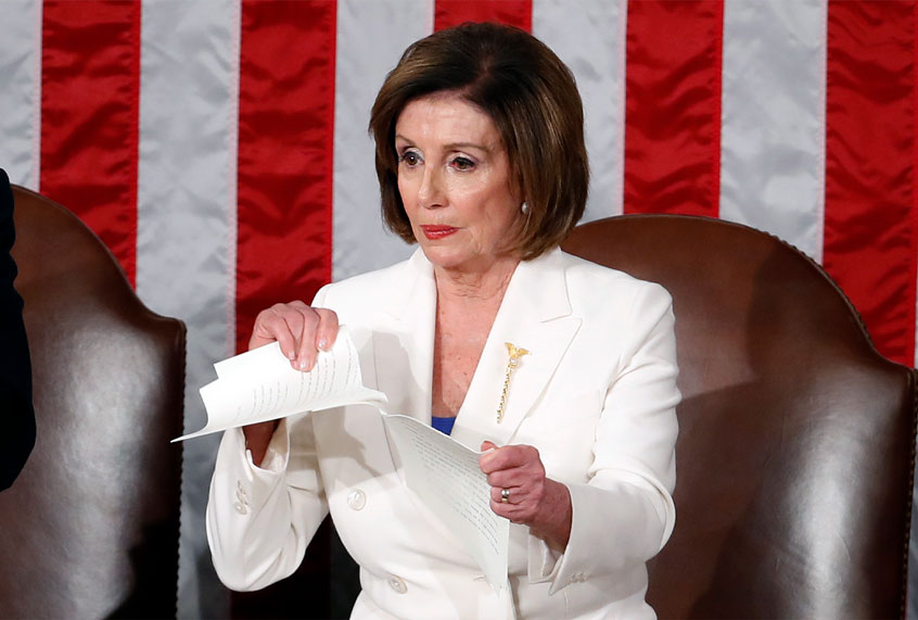 House Speaker Nancy Pelosi of Calif., tears her copy of President Donald Trump's State of the Union address after he delivered it to a joint session of Congress on Capitol Hill in Washington, Tuesday, Feb. 4, 2020. (AP Photo/Alex Brandon)