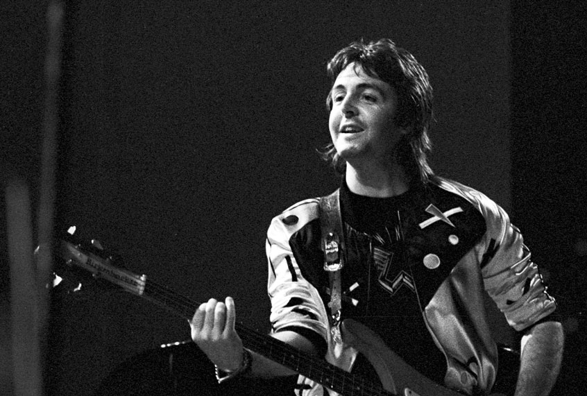 Paul McCartney performs live on stage with Wings at Ahoy in Rotterdam, Netherlands on March 25th 1976. (Gijsbert Hanekroot/Redferns/Getty Images)