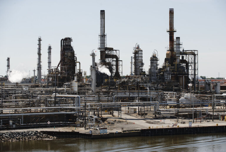 Exhaust billows from Philadelphia Energy Solutions Refining Complex in Philadelphia, Thursday, June 27, 2019. (AP Photo/Matt Rourke)