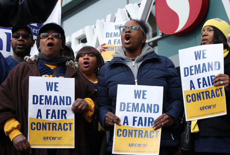 Giant and Safeway grocery store workers protest in front of a Safeway Store for fair union contract negotiations on February 19, 2020 in Washington, DC.