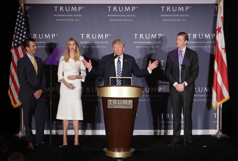 Donald Trump (C) delivers remarks with his children (L-R) Donald Trump Jr., Ivanka Trump and Eric Trump during the grand opening ceremony of the new Trump International Hotel October 26, 2016 in Washington, DC. (Chip Somodevilla/Getty Images)