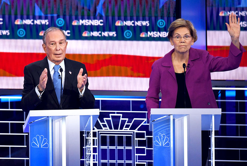Democratic presidential hopeful Massachusetts Senator Elizabeth Warren (R) gestures next to former New York Mayor Mike Bloomberg during the ninth Democratic primary debate of the 2020 presidential campaign season co-hosted by NBC News, MSNBC, Noticias Telemundo and The Nevada Independent at the Paris Theater in Las Vegas, Nevada, on February 19, 2020. (MARK RALSTON/AFP via Getty Images)